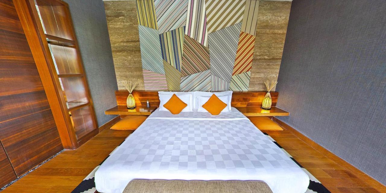 فندق تي إس سويتس سيمينياك بالي سمينياك المظهر الخارجي الصورة A bedroom
